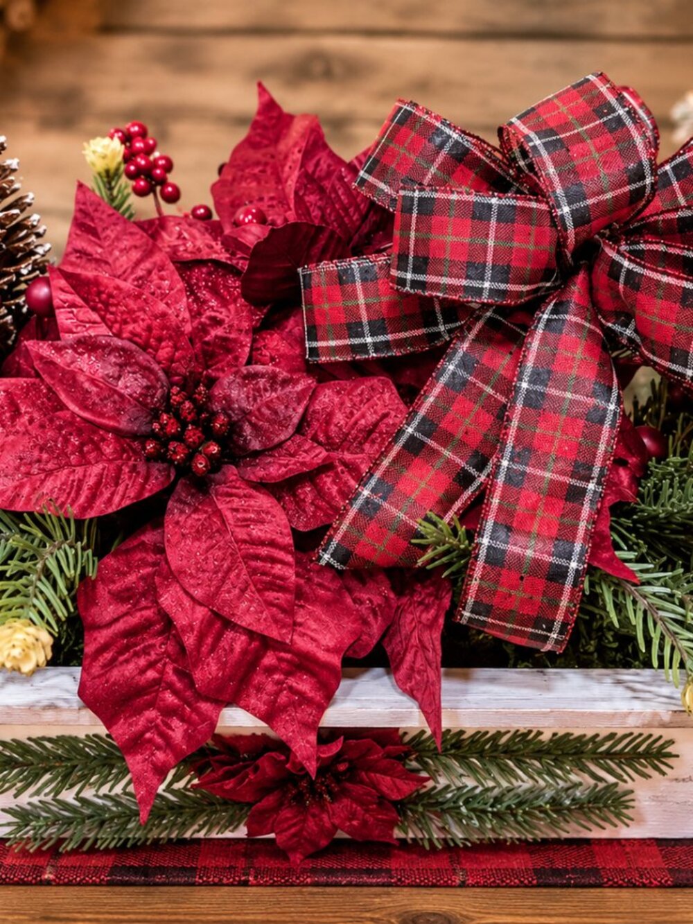 Christmas Poinsettia Floral Arrangement with Pinecones and Plaid Bow Centerpiece